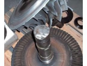 Broken turbocharger rotor shaft due to overspeed.